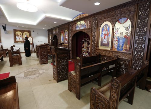 FAITH Story: Coptic pope to visit Winnipeg but no pope in pic.  St.Mark Coptic Orthodox Church, 1111 Chevrier Blvd. Subject: Father Marcos Farag, in photo along with interior of the church sanctuary in pic . June 9 2014 / KEN GIGLIOTTI / WINNIPEG FREE PRESS