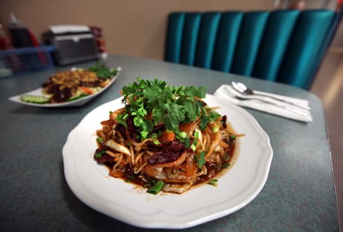 Beef with bean sprouts cabbage and onion. See Marion Warhaft's review of Watt Street Bistro.  June 9, 2014 - (Phil Hossack / Winnipeg Free Press)