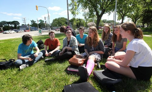 Windsor School students gather together on the front lawn  in early June during the final days of their 1st year in High School at Glen Lawn Collegiate.  This is becoming a rare gathering for the  students since many of them have made new friends now that they are in a larger school.  Names from left - Thomas, Noah, Garrett, Shelby, Quinn, Mackenzie, Hailey, Aby and Sydney.   Former Windsor School students face new challenges and take on new responsibilities in their first year in grade nine at Glen Lawn Collegiate. See Doug Speirs story.  June 04, 2014 Ruth Bonneville / Winnipeg Free Press