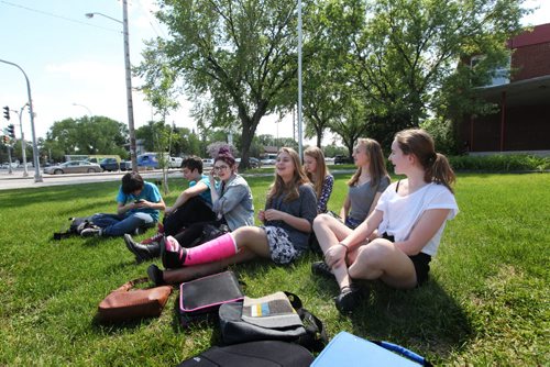 Windsor School students gather together on the front lawn  in early June during the final days of their 1st year in High School at Glen Lawn Collegiate.  This is becoming a rare gathering for the  students since many of them have made new friends now that they are in a larger school.   Names from left - Thomas, Quinn, Shelby,  Mackenzie, Hailey, Aby and Sydney.  Former Windsor School students face new challenges and take on new responsibilities in their first year in grade nine at Glen Lawn Collegiate. See Doug Speirs story.  June 04, 2014 Ruth Bonneville / Winnipeg Free Press