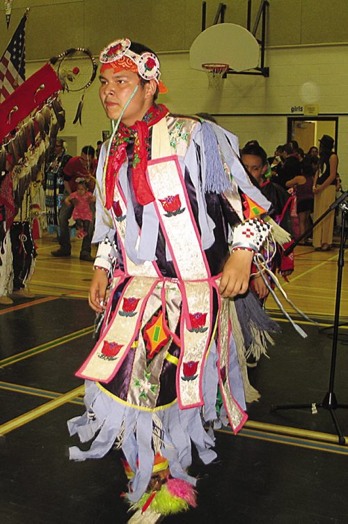 Canstar Community News June 6 2014 - A young powwow dancer at the fifth annual Seven Oaks Graduation Powwow. (JARED STORY/THE TIMES/CANSTAR COMMUNITY NEWS)