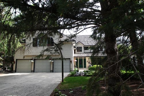 91 Shier Drive in Charleswood-Outside View-  See Todd Lewys story- June 10, 2014   (JOE BRYKSA / WINNIPEG FREE PRESS)