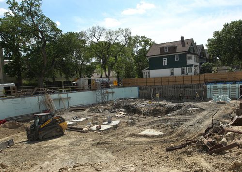 A huge dig to prepare the foundation for the Conrad House luxury apartment under construction at Norquay St and River Ave -  Standup Photo- June 10, 2014   (JOE BRYKSA / WINNIPEG FREE PRESS)