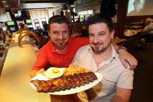 Silver Heights Restaurant and Lounge, 2169 Portage Ave. Tony Jr. Siwicki , left, and his brother J.C. with their famous BQ ribs-  See Maureen Scurfield story- June 10, 2014   (JOE BRYKSA / WINNIPEG FREE PRESS)