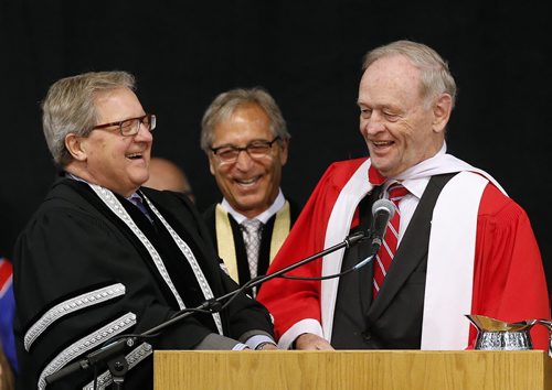LOCAL . UofW  Lloyd Axworthy President and Vice-Chancellor  with Chancellor Robert Silver   and former Prime Minister Jean Chretien, sharing laugh at the podium after honouring Chretien with honorary degree ( Axworthy's former boss in government)  , The 103rd  UofW Convocation , honoured Jean Chretien  by giving him an   honorary degree and he also gave  the  ketnote address  . with story June 12 2014 / KEN GIGLIOTTI / WINNIPEG FREE PRESS