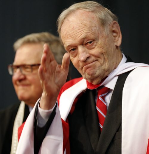 LOCAL  former   Prime Minister Jean Chretien waves to crowd after recieveing an  honorary degree at the 103rd  U of W Convocation , Jean Chretien  recieved the   honorary degree and also  gave  the  keynote address  . with story June 12 2014 / KEN GIGLIOTTI / WINNIPEG FREE PRESS