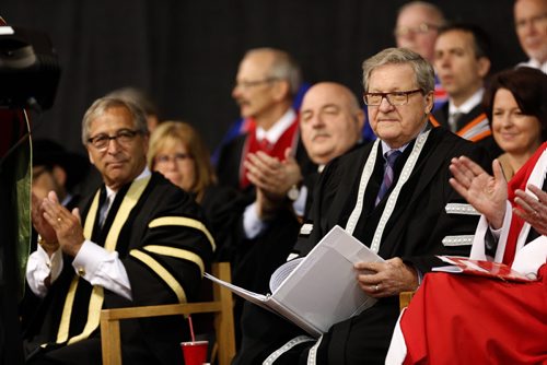 LOCAL .  UofW Chancellor Robert Silver (left) sits with   (right)  Lloyd Axworthy President and Vice-Chancellor 's last  convocation before retiring from the university   , This was the 103rd  UofW Convocation andt honoured former PM  Jean Chretien  by giving him an   honorary degree , Chretien alos gave  the  keynote address  . with story June 12 2014 / KEN GIGLIOTTI / WINNIPEG FREE PRESS