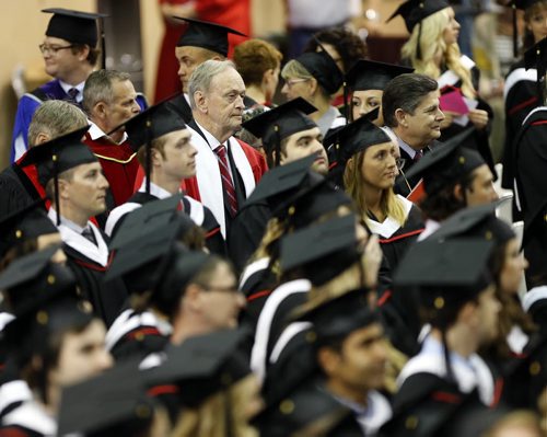 LOCAL . 103rd  UofW Convocation , Jean Chretien enters the the Duckworth Centre with students  and academic procession . Chretien  received an honorary degree and gave the keynote  address  to the graduates  . with story June 12 2014 / KEN GIGLIOTTI / WINNIPEG FREE PRESS