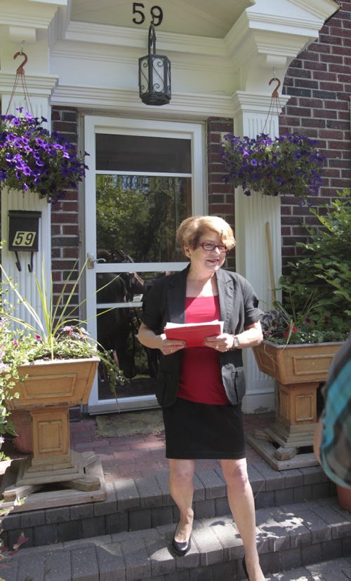 Mayoral candidate Judy Wasylycia-Leis holds a news conference in front of her home Thursday morning. Aldo Santin Story Wayne Glowacki / Winnipeg Free Press June 12 2014