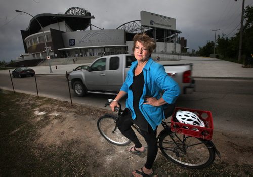 NO ATTENTION GIVEN TO CYCLISTS  Cycling advocate Janice Lukes who is also the active transportation representative on the IGF stadiums Event Day Activity Committee says pedestrian/bike safety has been ignored by city hall and stadium partners for two years. She also says  the City, the province, the Bombers and the U of M all share responsibility for cyclist safety going to Bomber games. (Kirbyson) June 13, 2014 - (Phil Hossack / Winnipeg Free Press)