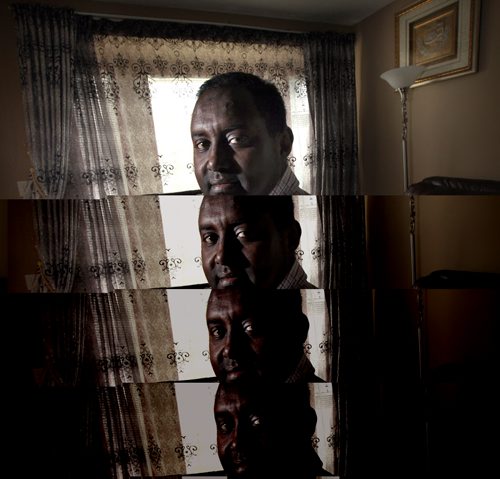 Ahmed Warsame, poses in his Ft Richmond home Friday. THe UNHCR head of operations for Dadaab, the worlds largest refugee camp, is back home in Wpg for a break. Se Carol Sander's story. June 13, 2014 - (Phil Hossack / Winnipeg Free Press)