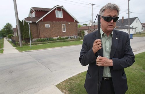 Winnipeg city councilor Ross Eadie talks about Super Mailboxes on Burrows Ave Friday night -  See Randy Turner story- June 13, 2014   (JOE BRYKSA / WINNIPEG FREE PRESS)