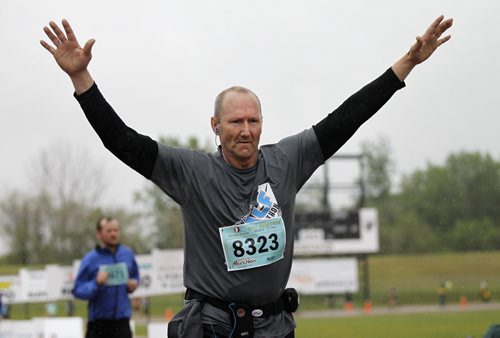 A half marathon participant at the Manitoba Marathon at the University of Manitoba, Sunday, June 15, 2014. (TREVOR HAGAN/WINNIPEG FREE PRESS)