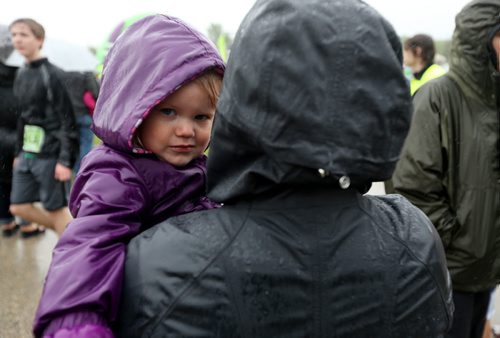 A young spectator during the Manitoba Marathon at the University of Manitoba, Sunday, June 15, 2014. (TREVOR HAGAN/WINNIPEG FREE PRESS)