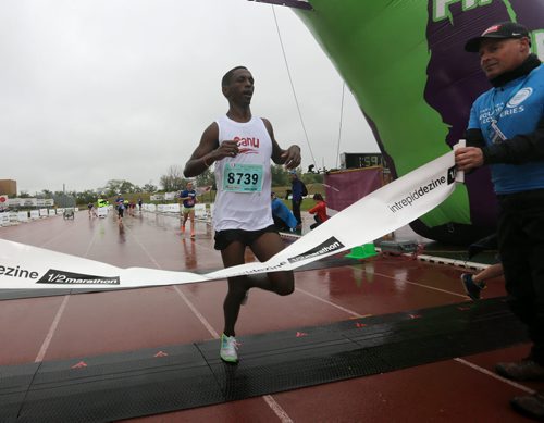 Half marathon winner, Abduselam Yussuf, during the Manitoba Marathon at the University of Manitoba, Sunday, June 15, 2014. (TREVOR HAGAN/WINNIPEG FREE PRESS)