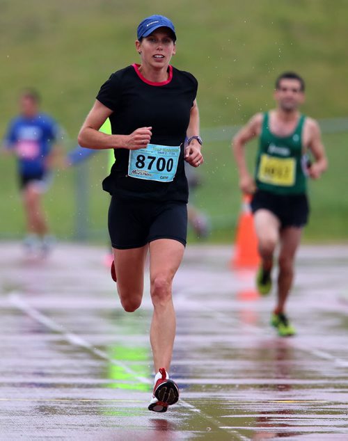 Women's half marathon winner, Cathy Cullen, during the Manitoba Marathon at the University of Manitoba, Sunday, June 15, 2014. (TREVOR HAGAN/WINNIPEG FREE PRESS)