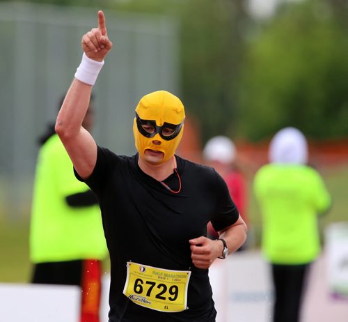 El Scorcho, always a participant at the Manitoba Marathon at the University of Manitoba, Sunday, June 15, 2014. (TREVOR HAGAN/WINNIPEG FREE PRESS)