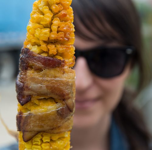 Bacon-wrapped corn on the cob from Fresh Roasted Corn stand. Red River Ex food reviews - Jen Zoratti story 140613 - Friday, June 13, 2014 - (Melissa Tait / Winnipeg Free Press)