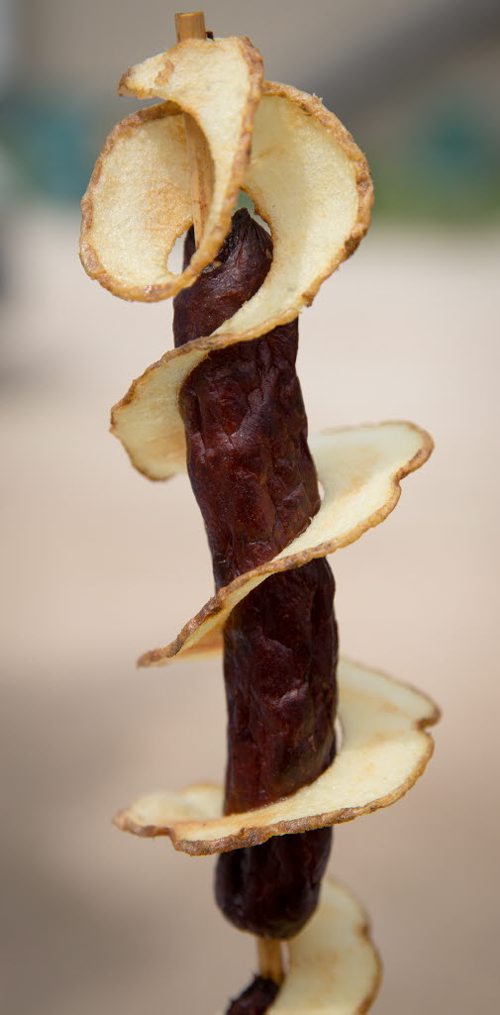 Chip dog from Chipstix stand. A fried potato wrapped around two deep friend hotdogs. Red River Ex food reviews - Jen Zoratti story 140613 - Friday, June 13, 2014 - (Melissa Tait / Winnipeg Free Press)