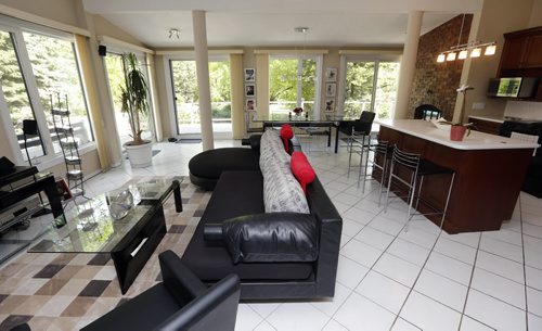 family room , litchen .HOMES . 6383 Southboine Dr.  Story by Todd Lewys June 16 2014 / KEN GIGLIOTTI / WINNIPEG FREE PRESS