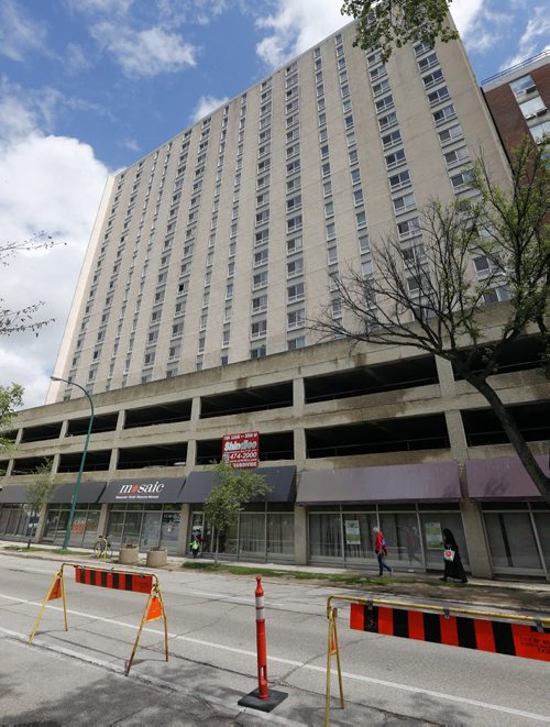 Local . Fallow on Cops story . A Winnipeg man is recovering from a fall from a 9th floor apartment  while escaping a police raid on a high rise apartment building at 360 Cumberland  Sunday night . June 16 2014 / KEN GIGLIOTTI / WINNIPEG FREE PRESS