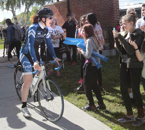 Clara Hughes on her bike heading to Kenora after a stop at Elmwood High School Monday morning to speak to students as part of Clara's Big Ride for Bell Let's Talk for mental health. Adam Wazny story Wayne Glowacki/Winnipeg Free Press June 16 2014