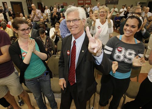 June 16, 2014 - 140616  -  Jim Carr gestures after winning the Winnipeg South Centre Liberal nomination at Centro Caboto Monday, June 16, 2014. John Woods / Winnipeg Free Press