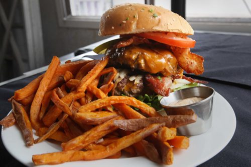 Cravings-266 4th Street East, Stonewall, MB, Canada-Double Deluxe burger with sweet potato fries- See Marion Warhaft review- June 17, 2014   (JOE BRYKSA / WINNIPEG FREE PRESS)