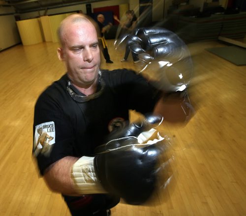 Former Winnipeg Blue Bomber Brett MacNeil demonstrates while training/teaching the martial art Wing Chun Do, which was created by Bruce Lee. MacNeil is in his 10th year as an instructor of this martial art. See Ashely Prest story. June 217, 2014 - (Phil Hossack / Winnipeg Free Press)