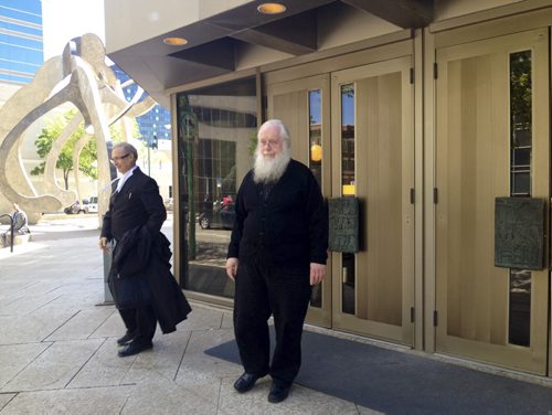 Seraphim (Kenneth) Storheim, now retired from the Orthodox Church in America, leaves the courthouse in Winnipeg on Wednesday. Storheim will be sentenced for sexual assault on June 18 , 2014.    JAMES TURNER/WINNIPEG FREE PRESS