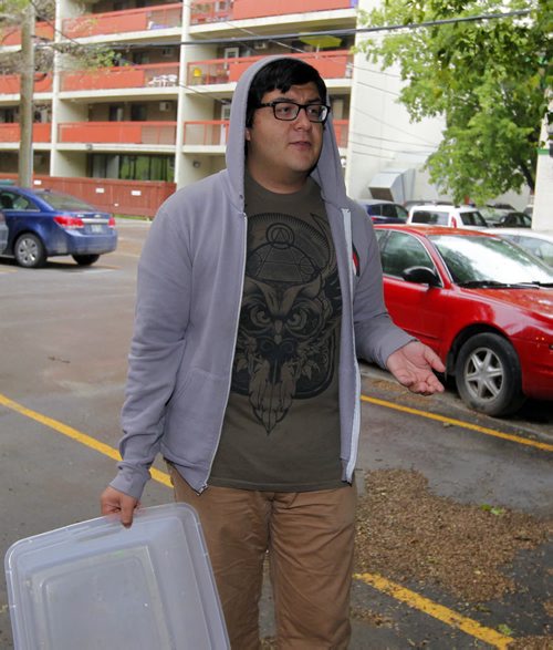 The Elm Spanworm infests Edmonton Street. Jose Castellanos talks to the reporter about how bad the bugs are. BORIS MINKEVICH / WINNIPEG FREE PRESS  June 19, 2014