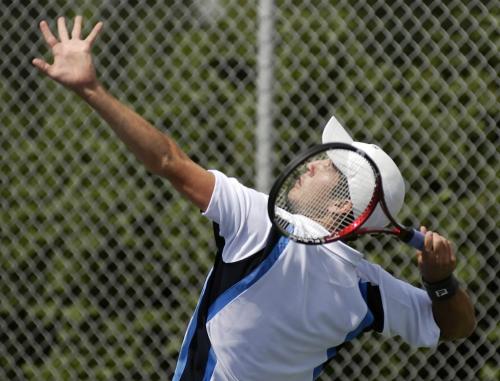 Number one seed Cristian Paiz lays out his serve during the Manitoba Open at the Kildonan Tennis Club on Friday. Paiz travelled from his home in Guatemala to compete in the tournament. Photo by Aaron Vincent Elkaim winnipeg free press