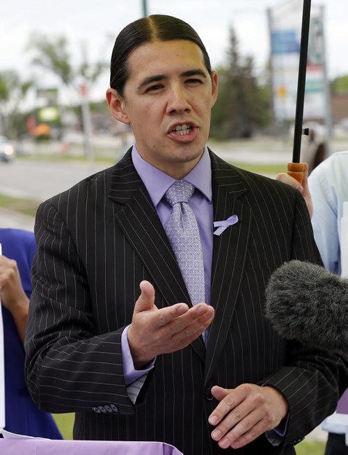 LOCAL - photo radar - Ouellette  WHO: Robert-Falcon Ouellette WHERE: Corner of Grant and Nathaniel .WHEN: Friday, June 20, 11:30 a.m. WHAT: Policy announcement on photo radar from mayoral candidate. Story by Aldo SantinJune 20 2014 / KEN GIGLIOTTI / WINNIPEG FREE PRESS