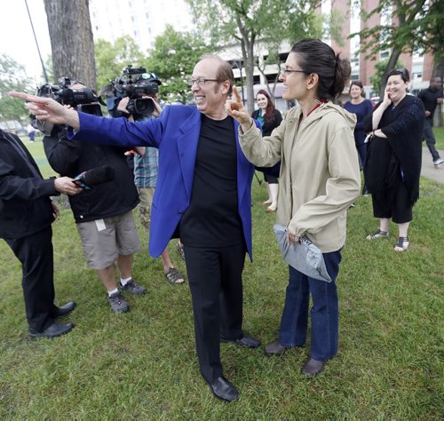 Sam Katz talks with Janine Braun  a member of the Central Park Neighbourhood Ass. Remembering when she first met him when the revitalization the park was just beginning. Mayor Sam Katz announces he will not run for another term as mayor of the city of Winnipeg  at a Central Park  scrum.  June 20 2014 / KEN GIGLIOTTI / WINNIPEG FREE PRESS