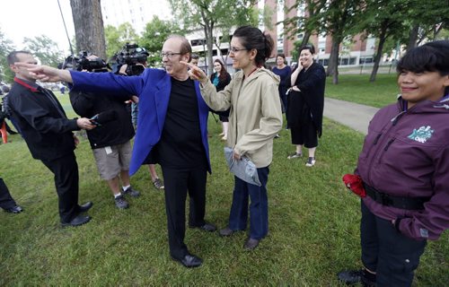 Sam Katz talks with Janine Braun  a member of the Central Park Neighbourhood Ass. Remembering when she first met him when the revitalization the park was just beginning. Mayor Sam Katz announces he will not run for another term as mayor of the city of Winnipeg  at a Central Park  scrum.  June 20 2014 / KEN GIGLIOTTI / WINNIPEG FREE PRESS