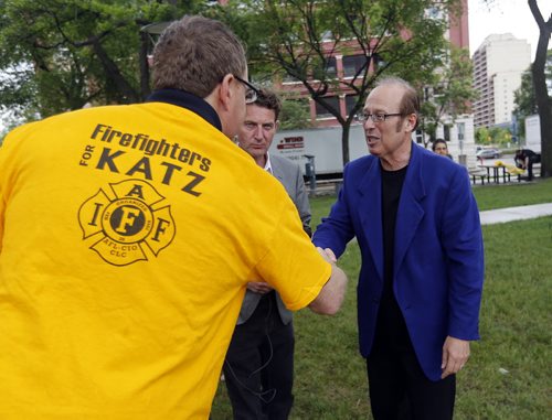 Alex Forrest President, United Firefighters of Winnipeg shakes hand with Sam Katz after his announcement . Mayor Sam Katz announces he will not run for another term as mayor of the city of Winnipeg  at a Central Park  scrum.  June 20 2014 / KEN GIGLIOTTI / WINNIPEG FREE PRESS