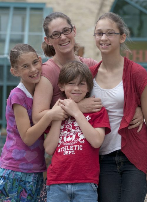 Mother Candice with her children Cyndel, left, Savannah, right,and Bash will be attending camp this summer thanks to funding from the Sunshine fund.- See Sunshine Fund- June 20, 2014   (Mike Sudoma / WINNIPEG FREE PRESS)