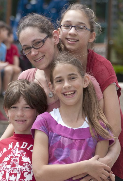 Mother Candice with her children Cyndel, left, Savannah,right, and Bash will be attending camp this summer thanks to funding from the Sunshine fund.- See Sunshine Fund- June 20, 2014   (Mike Sudoma / WINNIPEG FREE PRESS)