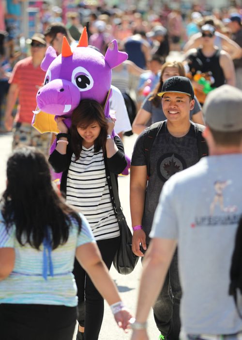 June 22, 2014 - 140622  -  Sarah Sananiego and Orlido Canlas enjoy the last day of The Ex Sunday, June 22, 2014. John Woods / Winnipeg Free Press