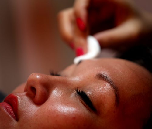 Connie Tamoto isprepped for eyebrow transformation. RE: Eyebrow filling in - new beauty service similar to lash extensions. See Connie's story.  June 23, 2014 - (Phil Hossack / Winnipeg Free Press)