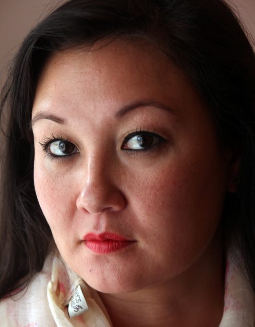 Connie Tamoto models her "before" eyebrows. Eyebrow filling in - new beauty service similar to lash extensions. See Connie's story.  June 23, 2014 - (Phil Hossack / Winnipeg Free Press)