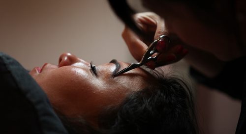 Connie Tamoto undergoes eyebrow transformation. RE: Eyebrow filling in - new beauty service similar to lash extensions. See Connie's story.  June 23, 2014 - (Phil Hossack / Winnipeg Free Press)