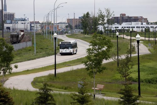 Stdup .Rapid Transit line budget meeting at City Hall . In pic the existing line that includes a bike path in action running from the downtown to Jubilee Ave .Wed. June 25 2014 / KEN GIGLIOTTI / WINNIPEG FREE PRESS