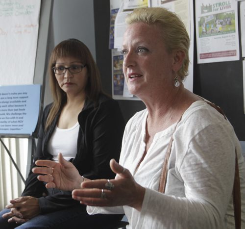 Tina Lussier and Jacquie Maytwayashing at left with support group of  Hepatitis C sufferers who are wanting coverage for an expensive new drug that has recently come on the market.    Larry Kusch story Wayne Glowacki / Winnipeg Free Press June 26 2014