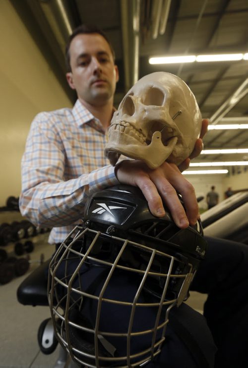 Sports Concussion story that includes Pan Am Concussion Program Dr. Michael Ellis . Story for 48.8  by Patrick Blennerhassett  June 27 2014 / KEN GIGLIOTTI / WINNIPEG FREE PRESS