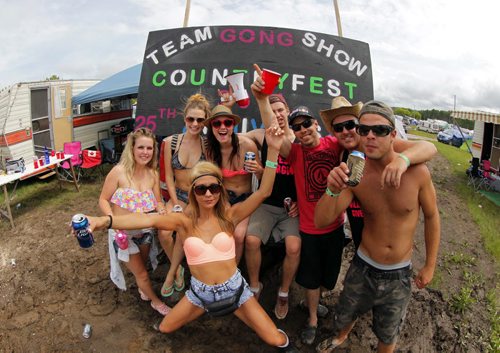 DAUPHIN'S COUNTRYFEST - Friday afternoon party in the campground. This group brought a sign. BORIS MINKEVICH / WINNIPEG FREE PRESS  June 27, 2014