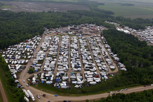 DAUPHIN'S COUNTRYFEST - SATURDAY -  Arial photos of the festival site taken from Gimli based Prairie Helicopters. Prairie Helicopters flies at various festivals around the province . BORIS MINKEVICH / WINNIPEG FREE PRESS  June 27, 2014