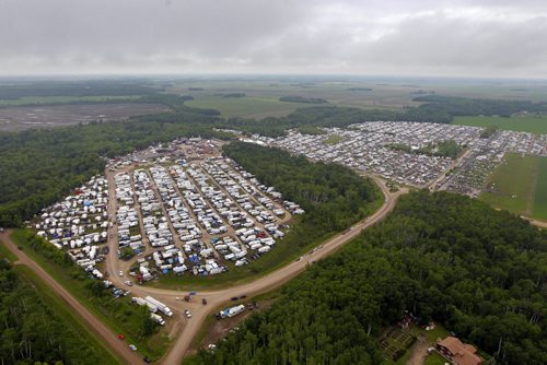 DAUPHIN'S COUNTRYFEST - SATURDAY -  Arial photos of the festival site taken from Gimli based Prairie Helicopters. Prairie Helicopters flies at various festivals around the province . BORIS MINKEVICH / WINNIPEG FREE PRESS  June 27, 2014