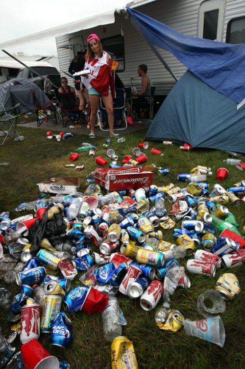 DAUPHIN'S COUNTRYFEST - SATURDAY -Festival goers killed some time during a rainy afternoon by drinking. Here are a few empties. BORIS MINKEVICH / WINNIPEG FREE PRESS  June 27, 2014