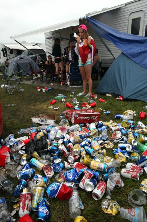 DAUPHIN'S COUNTRYFEST - SATURDAY -Festival goers killed some time during a rainy afternoon by drinking. Here are a few empties. BORIS MINKEVICH / WINNIPEG FREE PRESS  June 27, 2014
